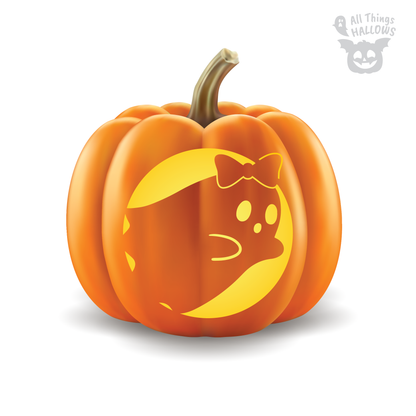 Coquette Bow Ghost Pumpkin Stencil carved on an orange pumpkin featuring a cute ghost with a bow inside a crescent-shaped design.