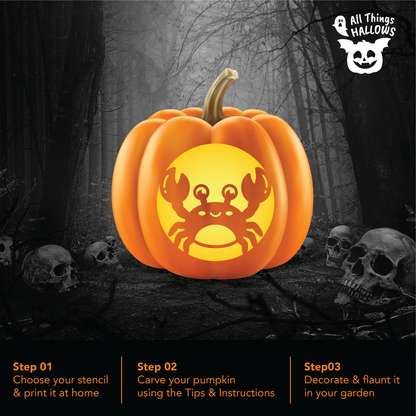 Crab Pumpkin Stencil carved into a glowing orange pumpkin displayed in a dark spooky Halloween forest with skull decorations.