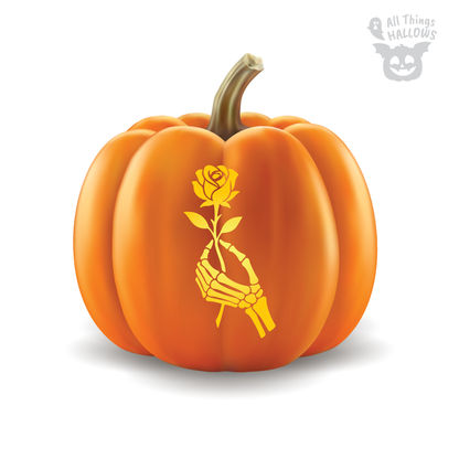 Skeleton Hand Rose Pumpkin Stencil carved on an orange pumpkin, featuring a skeletal hand delicately holding a blooming rose.