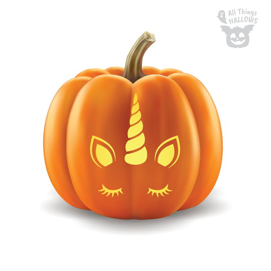 Cute Unicorn Pumpkin Stencil preview showing a glowing unicorn horn, pointed ears and closed eyelashes carved on an orange pumpkin.