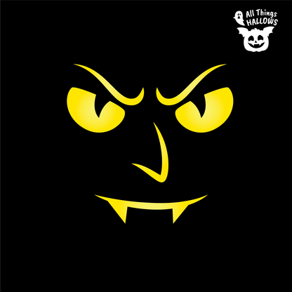 Vampire Skull Pumpkin Stencil design showing menacing eyes, arched eyebrows, pointed nose, curved mouth, and two sharp vampire fangs.
